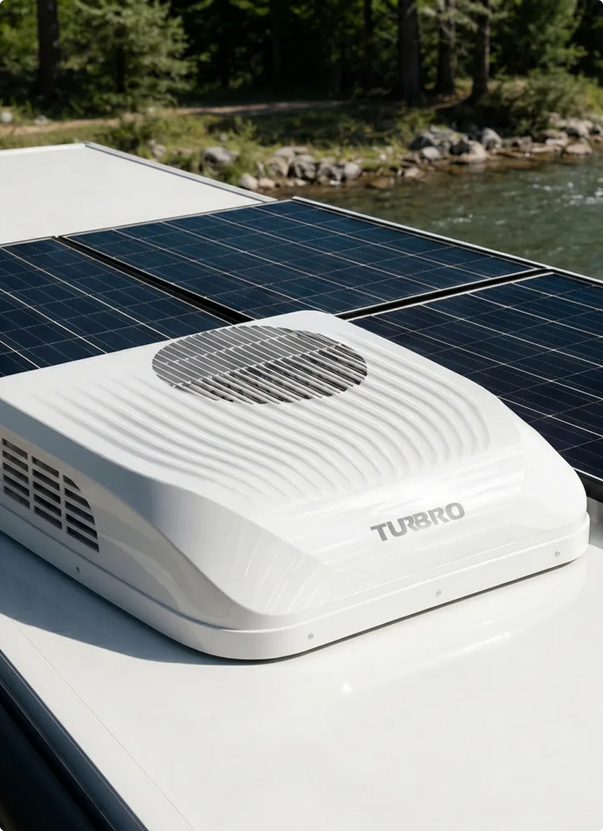 Solar panel system on a vehicle with a scenic background of water and trees.