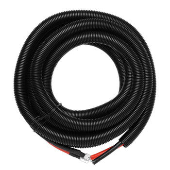 Coiled black cable with red and black connectors on a white background,view 1